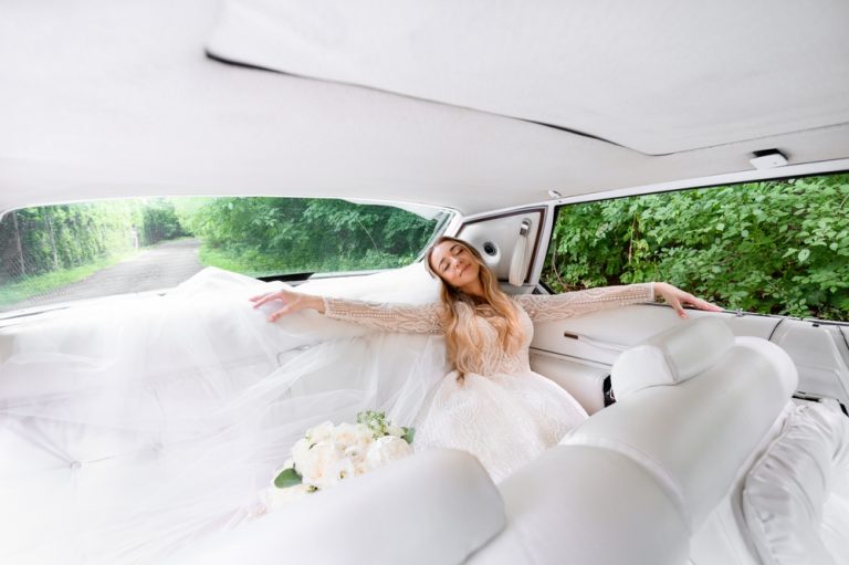 Side,View,Of,Pretty,Girl,In,Wedding,Dress,,Lying,On