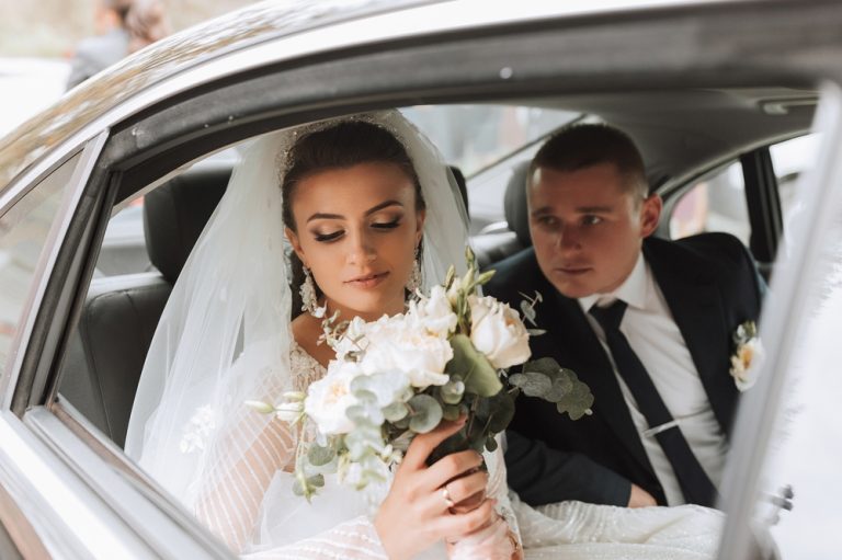 A,Modern,Bride,And,Groom,In,A,Lace,Dress,In