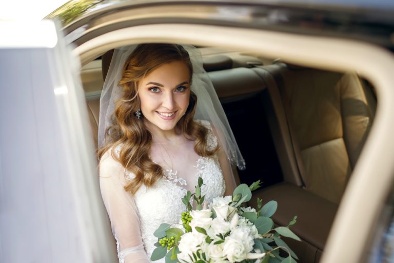 A,Beautiful,Smiling,Bride,On,Her,Wedding,Day,Sits,In
