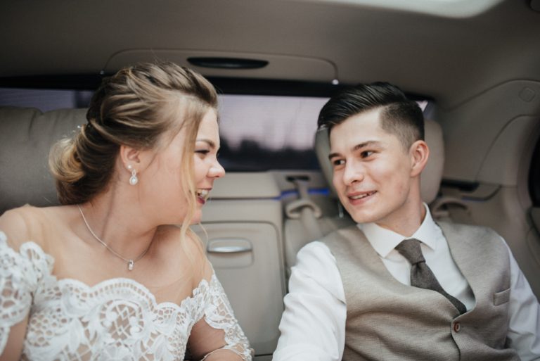 Bride,And,Groom,In,The,Car